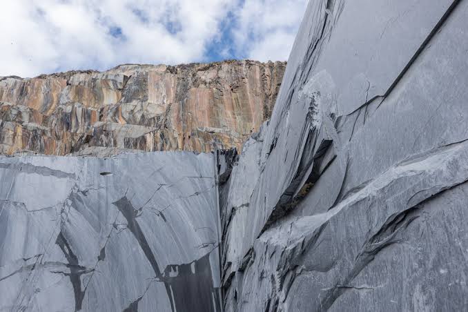 Natural stone quarry face showing geological texture