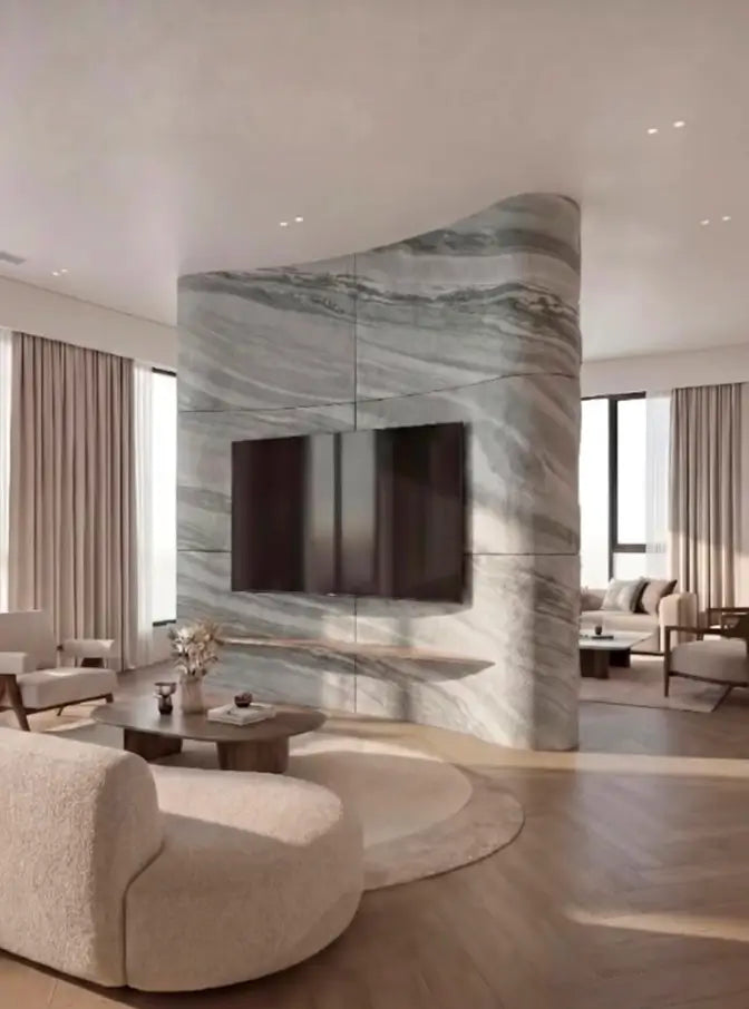 Aspara marble stone veneer curved TV feature wall in a living room.