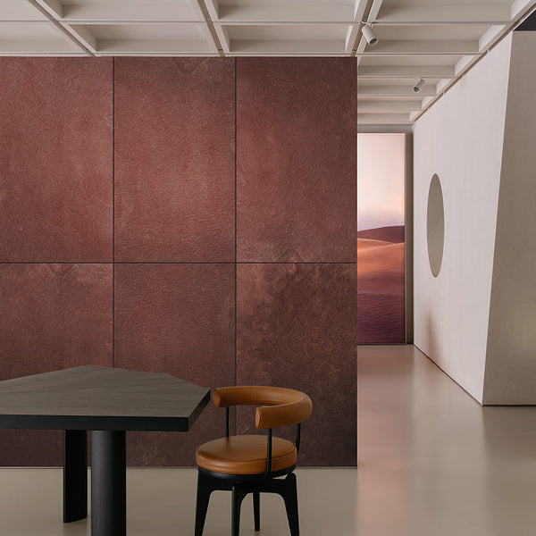Moonga red sandstone stone veneer wall panels in an office.