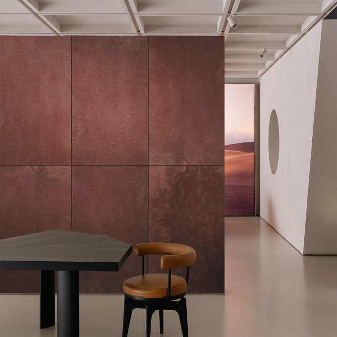 Moonga red sandstone stone veneer wall panels in an office.