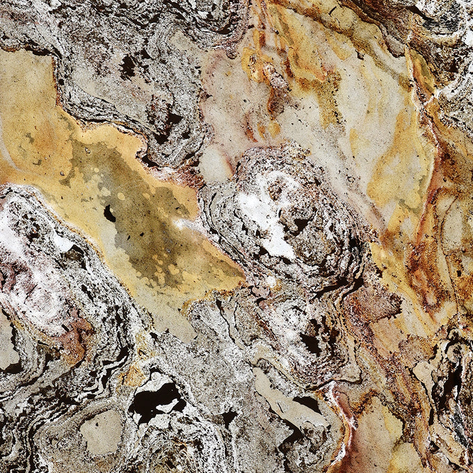 Surya silver and gold translucent stone veneer swatch in cool light.