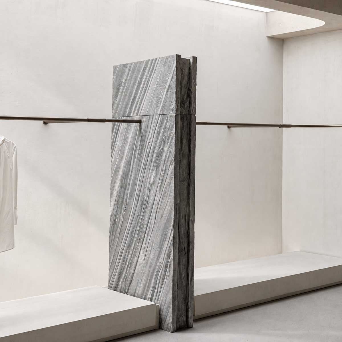 Lanita gray stone veneer column application in a minimalist retail interior.