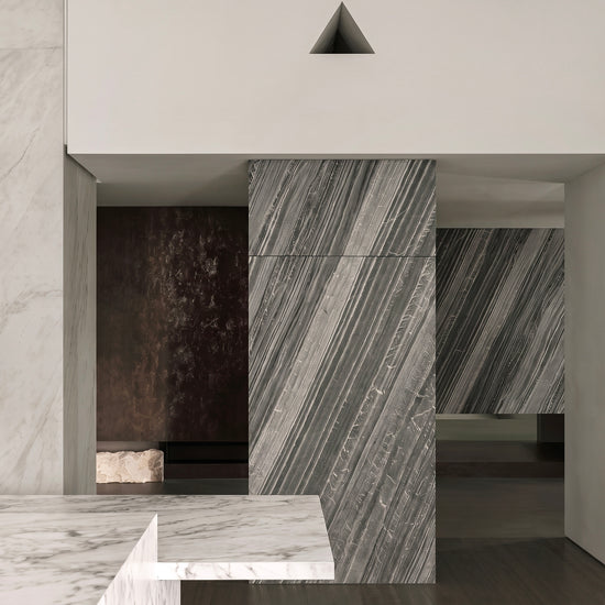 Lanita gray stone veneer column and wall application in a modern kitchen.