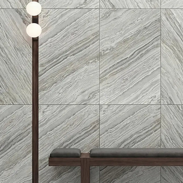 Satya grey marble stone veneer feature wall behind a bench.